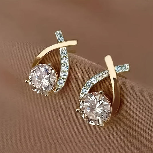 Boucles d'oreilles en puce avec croix dorée et zirconiums